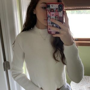 Soft, white mock neck sweater